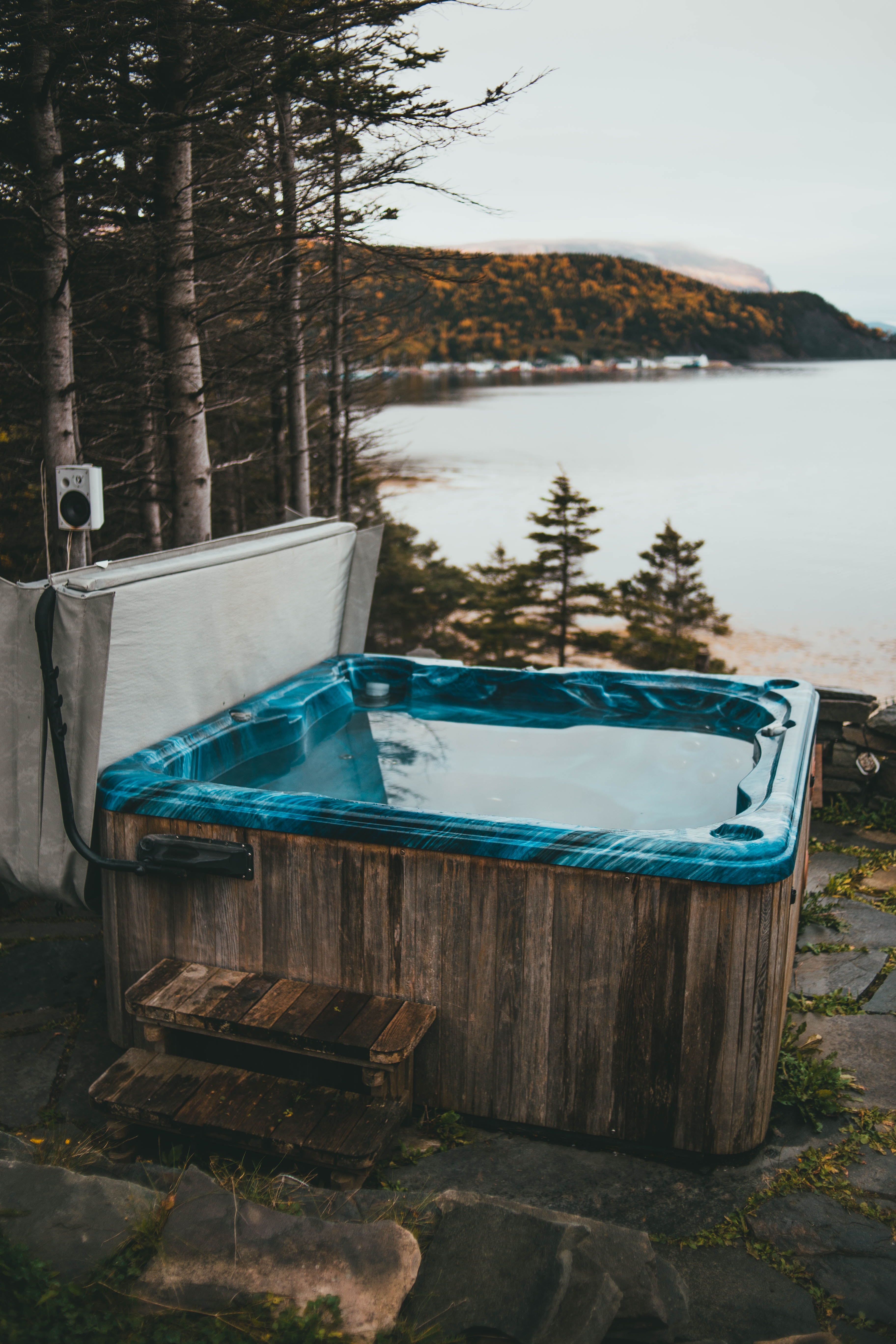 Hot tub sitting in front of mountains